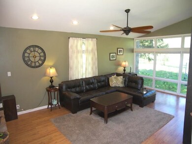 View 2 of great room.  Big windows make the pretty