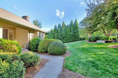 Front Sidewalk: Visualization and feeling are key to a successful Home buying experience. As you look at these pictures, feel how great it would be living here, calling this Your Home. It feels like HOME when you can see yourself in every room. Here we have a nice view of the brick paved front sidewalk, some of the nice green grass, shrubs, trees and planter boxes. Home sits in a nice gated community.