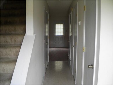 Downstairs Hall Looking into Living Room from Fron