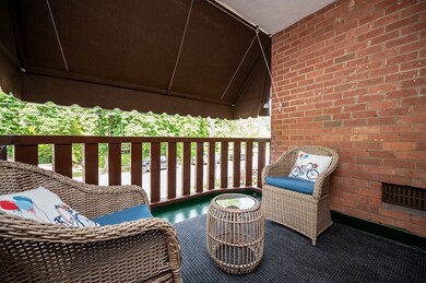 Tranquil balcony with new awning.