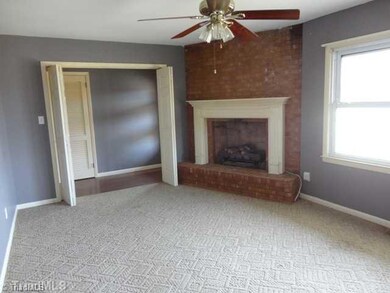 Living Room. Corner gas fireplace