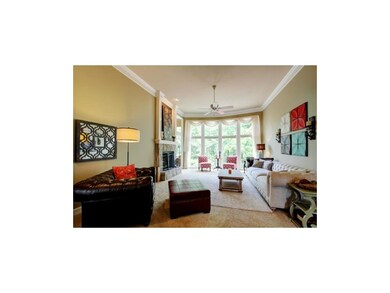 The great room features soaring ceilings, fresh ca
