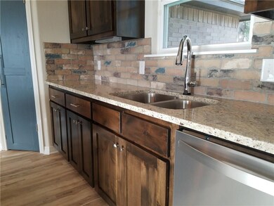 DOUBLE KITCHEN SINK WITH A GORGEOUS VIEW OF THE BA