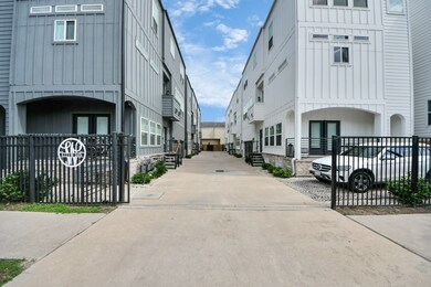 Modern townhouses with a sleek design, featuring a