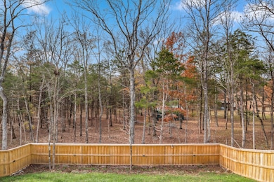 Check out this view!  Home backs to privately owned wooded space for privacy and peaceful enjoyment of the backyard space.