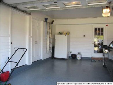 Fully finished garage with painted floors.