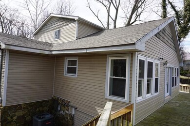 This side of the deck exits to the side yard leadi
