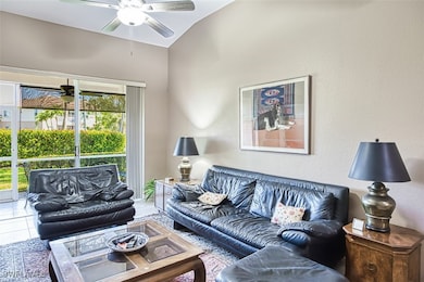 Living area with plenty of natural light, vaulted