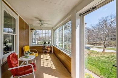 ENCLOSED FRONT PORCH