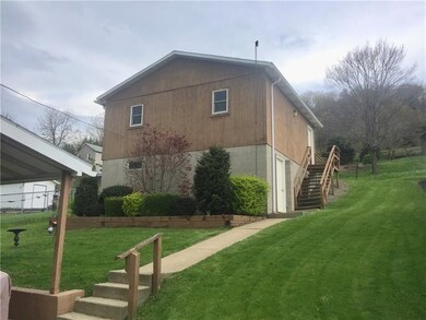 2 story garage!  Back alley access to 2 bay car/tr