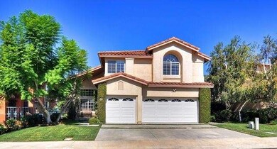 Property has mature trees for shade and privacy.