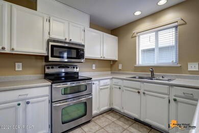 Kitchen w/White Cabinets