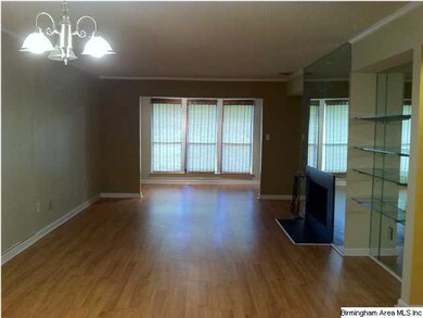View from entry through living/dining room and int