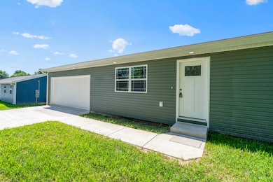 407 W Adamson St, Miller, MO 65707 - photo 3