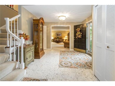 Gracious Marble Foyer greets family and friends