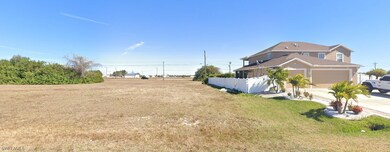 View of yard featuring a garage