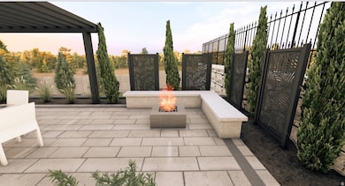 Patio terrace at dusk with a patio and a pergola