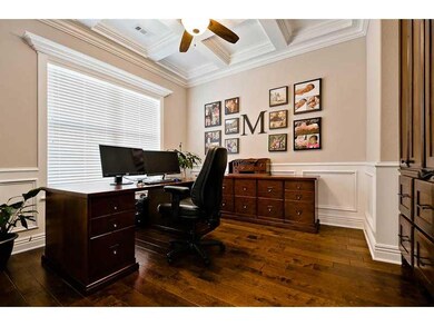 Executive Office/Suite. 6 full extension custom file cabinets, Double French doors, coffered ceiling.