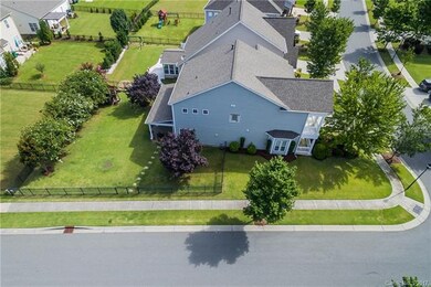 This aerial view of the right side of the home sho