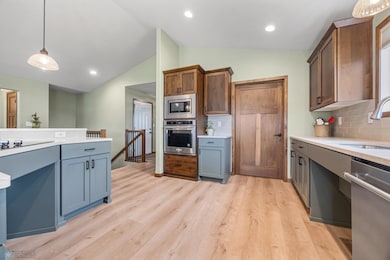 Hickory cabinets with mounted microwave & convection oven