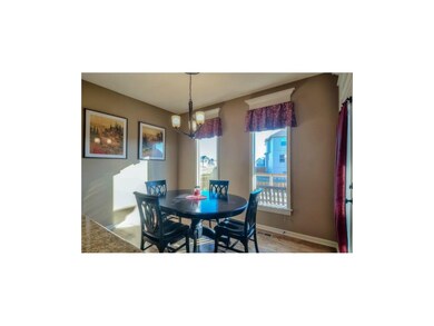 Eat-in area off kitchen.
