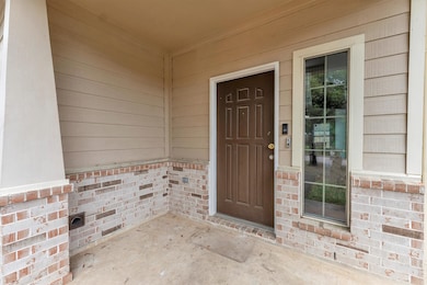 Covered front porch and entryway.