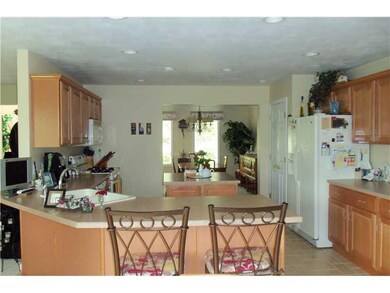 Kitchen. Kitchen with breakfast bar open to the di