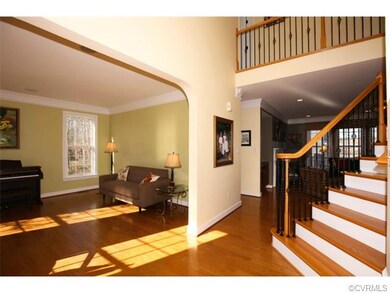 Transitional foyer view, partial view of formal li