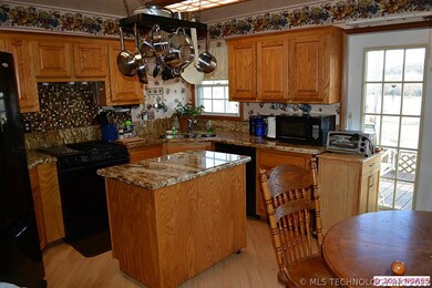 Light and bright kitchen with center island.
