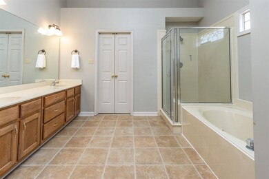 Double Vanity, Separate Stand Alone Shower.