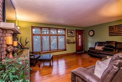 Living room with hard wood floors.