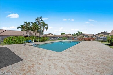 Pool with fence and a patio area