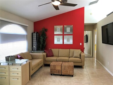 Living room with fresh paint and new ceiling fan
