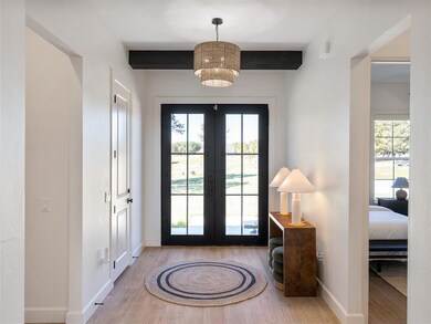 Doorway to outside featuring light hardwood / wood