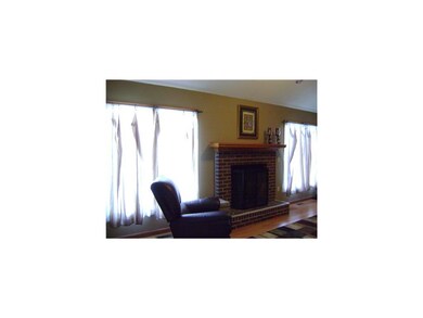 Family Room. Woodburning Fireplace