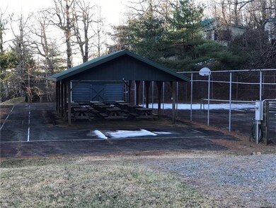 Community picnic area and showing tennis courts