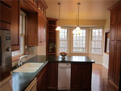 Kitchen. Kitchen has clean lines with gleaming har