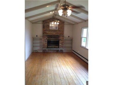 Family Room. Family room with fireplace and vaulte