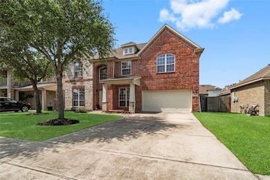 The extended driveway, complemented by a sidewalk