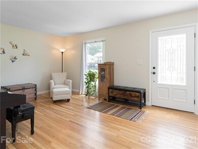 Welcoming entry room is perfect for music or formal sitting area.
