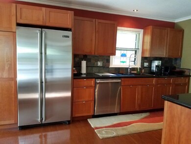 custom Cherry Thomasville cabinets; Jenn-Air apppl
