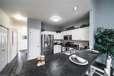 Eat in kitchen with stainless steel appliances and