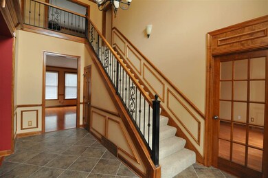 Step inside the 2-story foyer and be greeted by ti