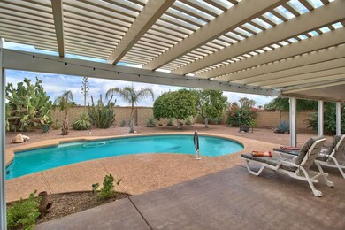 Beautiful pool with louvered patio