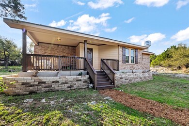 View of front of property featuring a front yard,