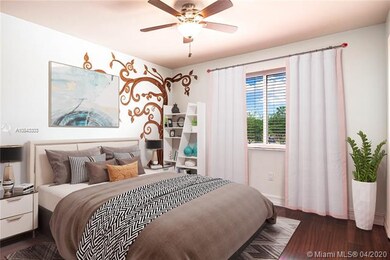 2rd bedroom on 2nd floor with hardwood floors