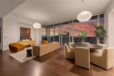 Enjoy beautiful sunsets with expansive southern views with the sun traveling from the east rising over the primary suite and setting in the west over the living room. This is an actual photo of the sunset.