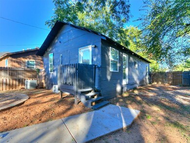 View of front of home featuring a fenced backyard