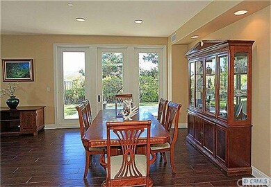 Formal dining area and view to patio.