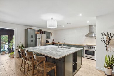 Fabulous upscale kitchen! Add additional cabinets or shelving to your taste.